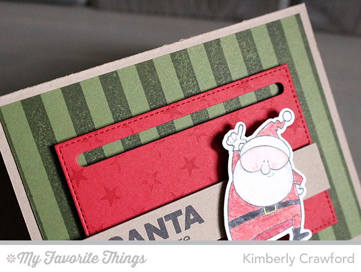 a close up of a card with a santa clause on it