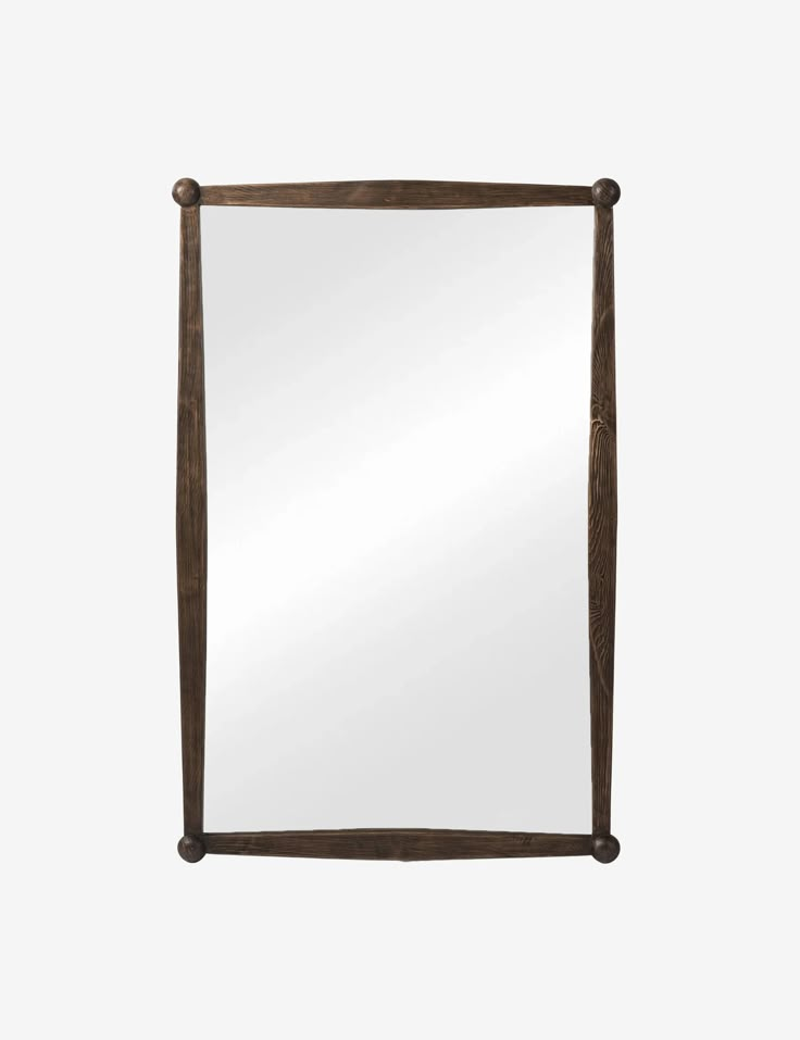 a wooden frame mirror on a white background with the reflection of an object in it