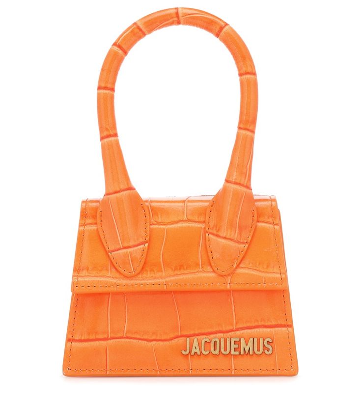 Jacquemus - Le Chiquito micro tote - The micro bag held by every it-girl around, the Le Chiquito from Jacquemus has set the style set and social media alight. Crafted from embossed orange leather, it features a top handle as well as petite logo lettering. seen @ www.mytheresa.com Jacquemus Le Chiquito, Tiny Purse, Purse Trends, Stylish Petite, Jacquemus Bag, Micro Bag, Orange Bag, Bag Trends, Street Style Inspiration