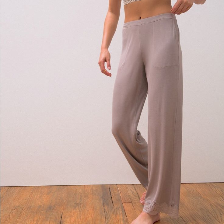 Soma Model Pull On Ribbed Pants With Lace Bottom. The Incredibly Soft Modal Silky Fabric Is Designed To Keep You Comfy While Sleeping Or Lounging With A Stretch That Moves With You. In Addition, It Has A Beautiful Drape And Is Wrinkle-Resistant So You'll Always Look Fresh. Pants Details: Ribbed Detail Lace Detail Front Pockets Flat Waistband 30" Inseam. 93% Rayon, 7% Spandex. Modal Blend. Machine Wash. Imported. Color: Smokey Taupe Msrp: $59 Brand New With Tags Factory Sealed I Full Length Pants For Relaxation, Relaxation Full-length Pants In Solid Color, Comfortable Straight Pants For Relaxation, Full Length Seamless Casual Pants, Casual Full-length Seamless Pants, Casual Full Length Seamless Pants, Stretch Soft Touch Bottoms For Relaxation, Wide Leg Stretch Bottoms For Relaxation, Stretch Wide Leg Bottoms For Relaxation