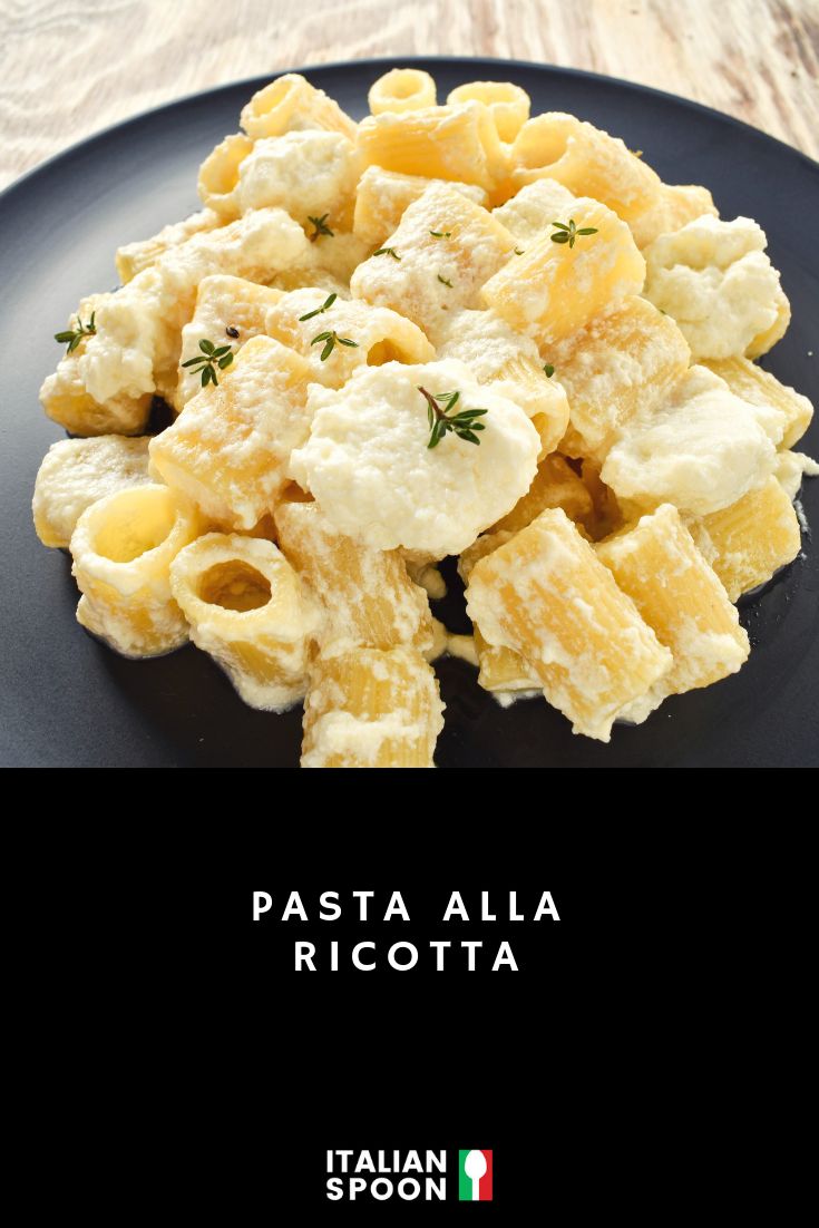 pasta alla ricotta on a black plate