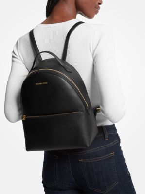 From gym sessions to city commutes, our Sheila backpack has you covered. The textured style comes with a dedicated pocket inside for your tablet, as well as a front zip pouch for smaller items. Adjust the buckled straps on the back for the perfect drop. Cheap Black Single Compartment Backpack, Cheap Casual Sports Backpack, Cheap Sports Backpack For Women, Cheap Black Leather Backpack For Students, Cheap Casual Backpack With Logo, Michael Kors Backpack Women, Cheap Gym Backpack With Zipper Closure, Michael Kors Rucksack, Cool Backpack