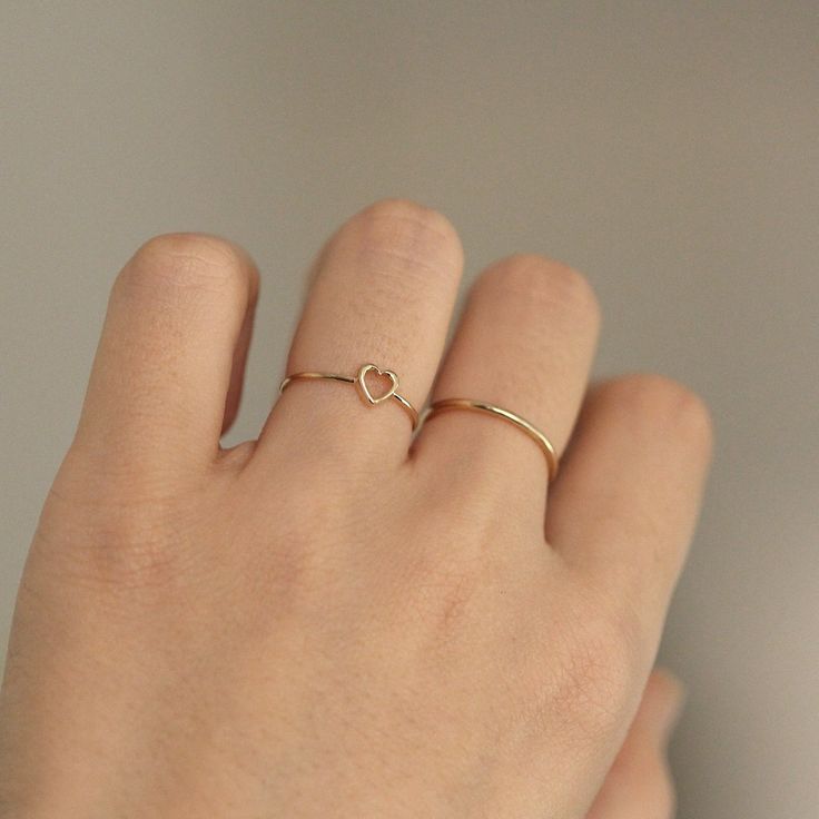 Heart Ring, 14K Solid Gold Open Heart Ring, 14K Wedding Ring, Engagement Ring, Minimalist Ring, 14K Solid Gold Ring, Promise Ring, Love Ring ≫ Product Details ◈ Handmade / Handcrafted Fine Jewelry ◈ Thickness: 1.2 mm ◈ Metal: Solid 14K Gold ◈ Gold Color: White gold, Rose gold, Yellow gold ≫ Please read our FAQ below for more detail. Delicate Heart-shaped Stackable Promise Rings, Minimalist Heart Shaped Stackable Promise Rings, Tiny Delicate Heart Promise Ring, Delicate Tiny Heart Promise Ring, Delicate Heart Promise Ring, Minimalist Heart Ring With Simple Design, Dainty Gold Heart Ring For Promise, Dainty Heart Ring With Simple Design For Promise, Minimalist Heart-shaped Ring With Simple Design