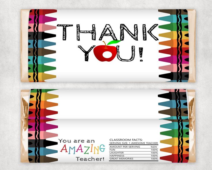 two candy bars with colorful crayons on them and the words thank you are an amazing teacher