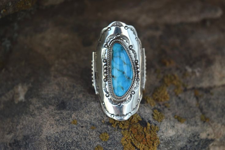 Beautifully crafted sterling silver ring surrounding a stunning Turquoise Stone. From the Rodgers Collection. Handmade in the USA. Size 8 Western Sterling Silver Gemstone Ring, Western Style Sterling Silver Gemstone Ring, Western Style Blue Sterling Silver Ring, Handmade Western Style Silver Turquoise Ring, Handmade Silver Turquoise Ring In Western Style, Handmade Western Turquoise Ring In Sterling Silver, Native American Jewelry, Turquoise Stone, Sterling Silver Ring