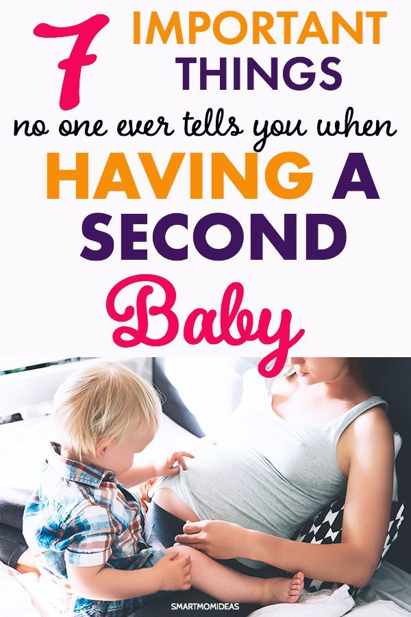 a baby sitting on top of a bed next to an adult and the words, 7 important things no one ever tells you when having a second child