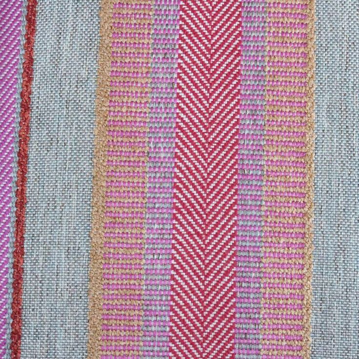 an up close view of some colorful fabric