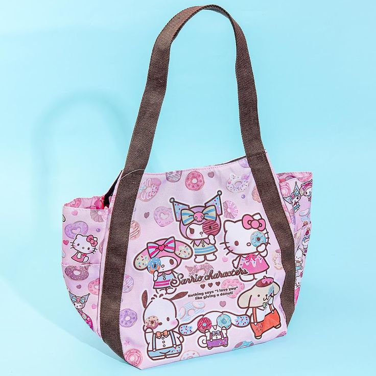 a pink hello kitty bag on a blue background