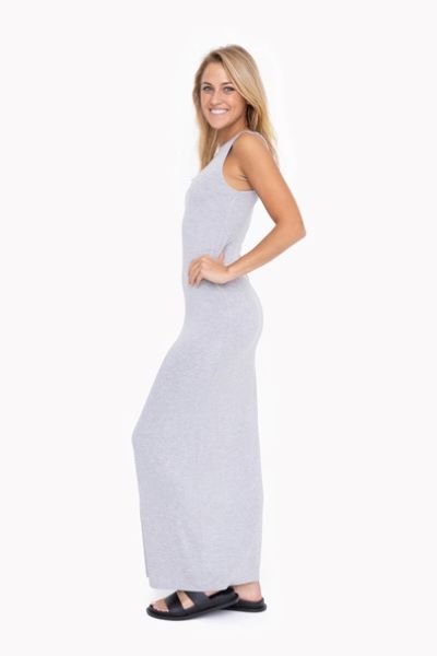 Stylish and comfortable maxi dress. Product Description: Unleash your beachy side with our Keyhole Back Maxi Dress! This soft, drapey rayon blend fabric will keep you comfortable on your stroll, while the keyhole detail adds a touch of elegance. Dress it up for date night or keep it casual for a walk by the shore. A versatile must-have! Fit: Model is 5'7" and is wearing a size Small. Material: 95% Rayon 5% Spandex Sleeveless Summer Maxi Dress For Loungewear, Maxi Dress With Side Slits For Day Out, Fitted Modal Maxi Dress, Solid Floor-length Maxi Dress For Vacation, Solid Color Floor-length Maxi Dress For Vacation, Summer Stretch Maxi Dress With Side Slits, Spring Maxi Dress For Lounging, Stretch Maxi Dress With Side Slits For Summer, Summer Maxi Dress With Side Slits For Day Out