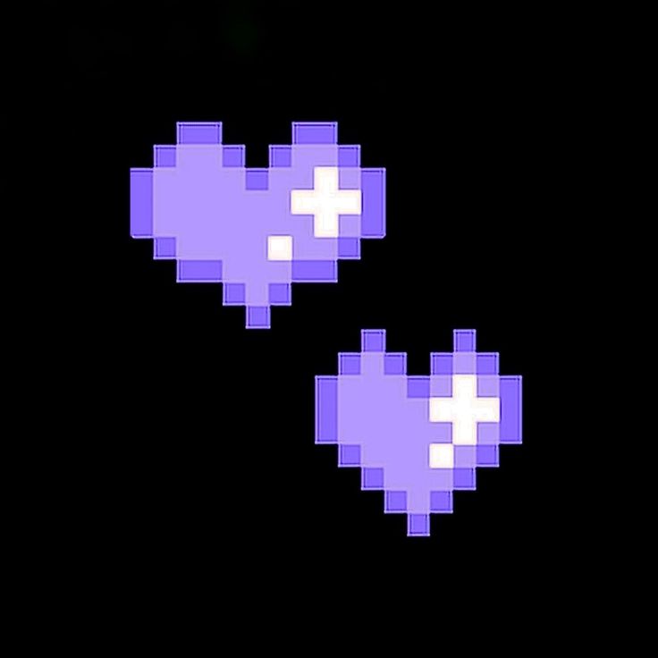 two pixel hearts are shown in the dark