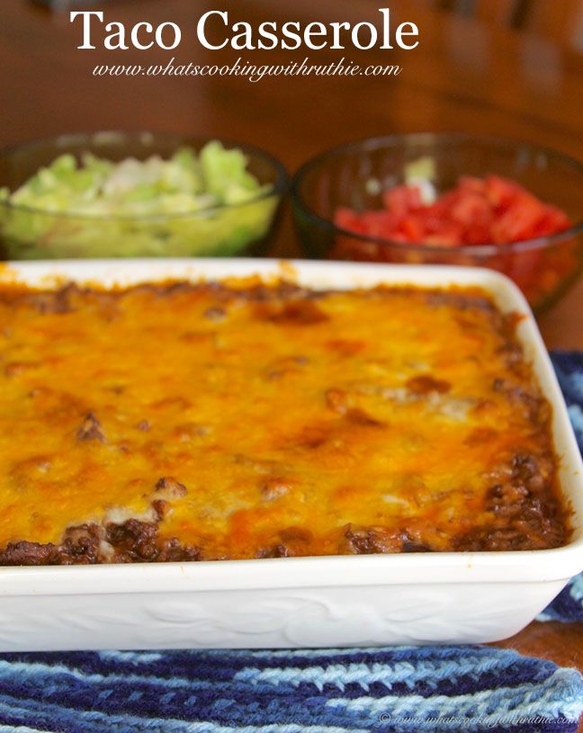 taco casserole in a white dish on a table