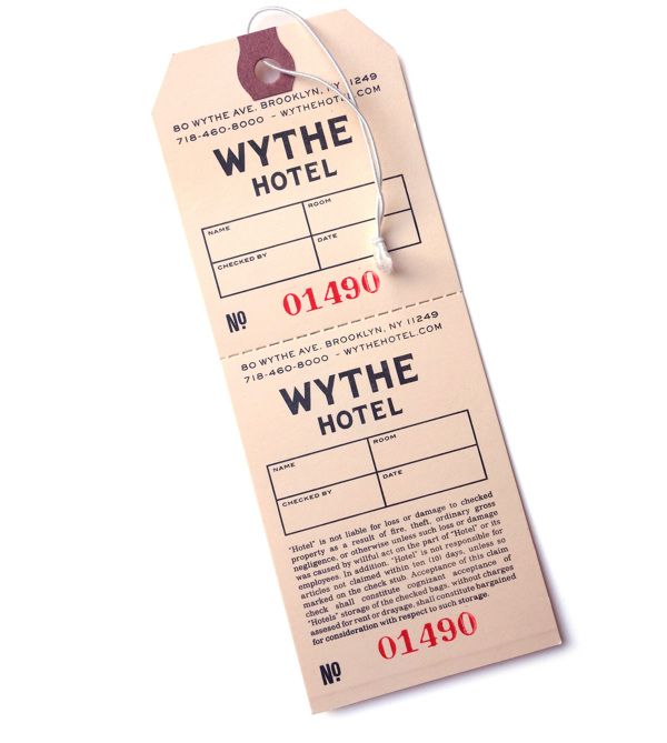 two luggage tags with the words wythe hotel on them