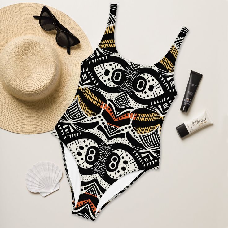 Urban African Print Bathing Suits – a bold fusion of style and culture. These swimsuits aren't just beachwear; they're a statement! Picture yourself strutting poolside or catching waves in designs that reflect you. African Print, One Piece Swimsuit, The Struts, Bathing Suits, One Piece