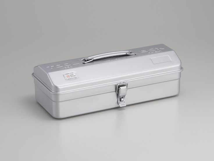 a white suitcase sitting on top of a table