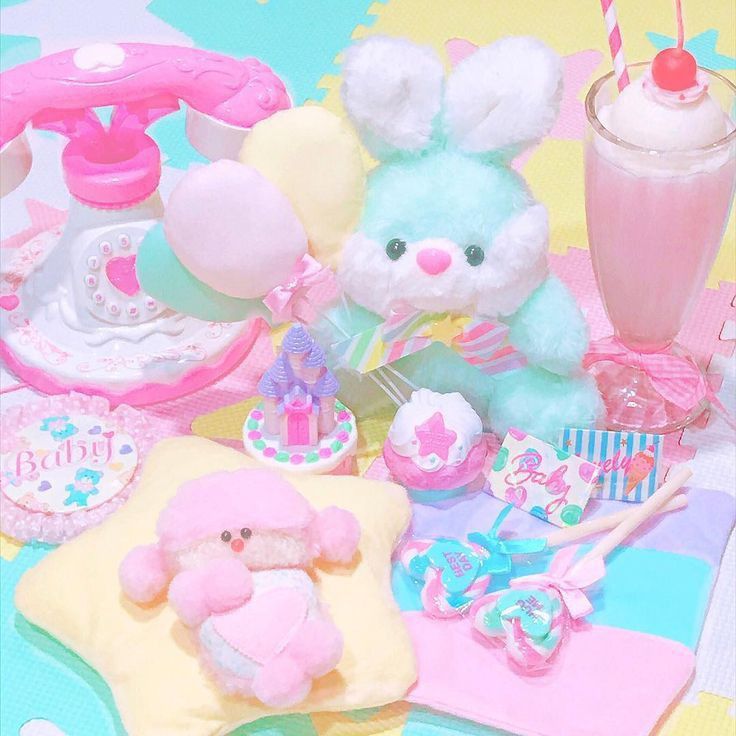 there is a teddy bear and other items on the table