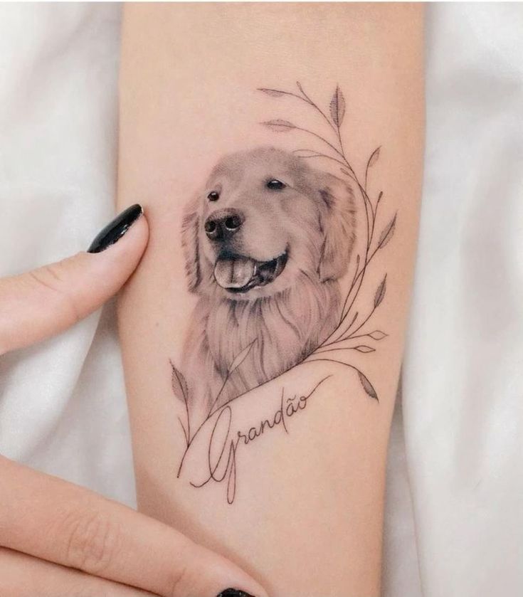 a woman's arm with a dog on it and the words grandma written in cursive writing