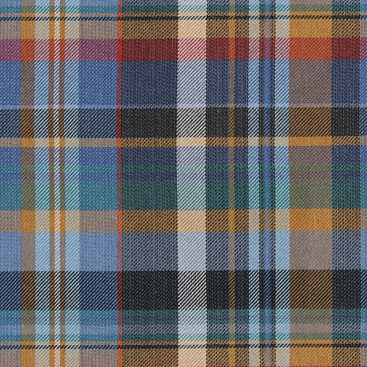 a plaid fabric with many colors and patterns