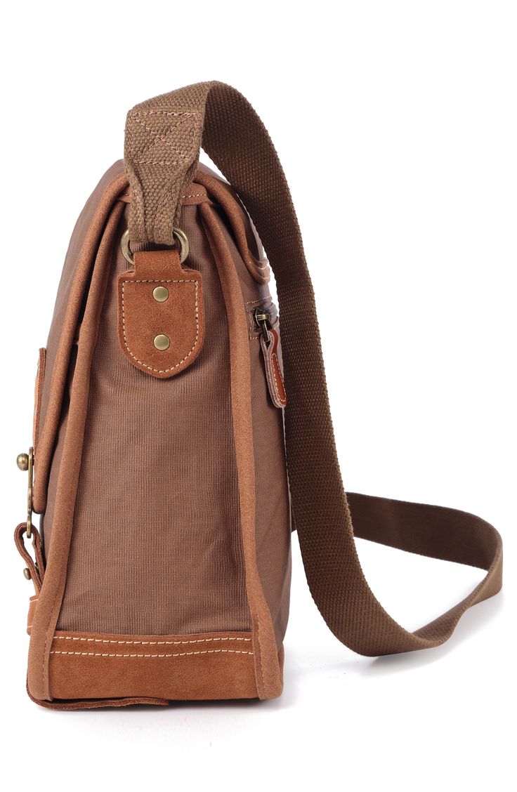 With a stylish design that can be carried by men and women, this flap bag offers plenty of slots to organize all of your essentials when traveling through town. 14"W x 12"H x 5"D; 24" strap drop Textile/leather Imported Casual Brown Laptop Backpack, Casual Brown Laptop Bag For Outdoor, Brown Shoulder Bag With Anti-theft Pocket, Casual Brown Laptop Bag For Travel, Casual Brown Travel Laptop Bag, Brown Rectangular Shoulder Bag With Anti-theft Pocket, Outdoor Brown Bags With Zipper Pocket, Brown Flap Satchel For Everyday, Casual Travel Briefcase In Shoulder Bag Style