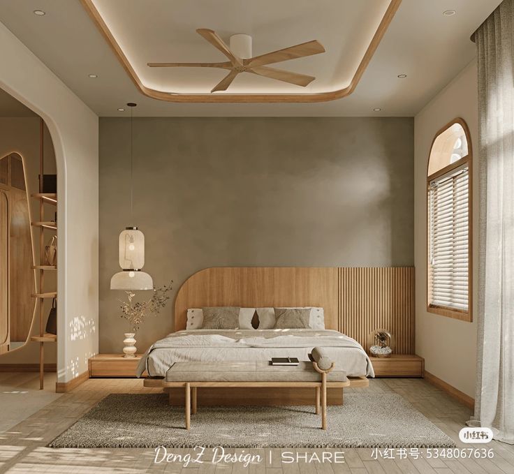 a bedroom with a large bed and ceiling fan