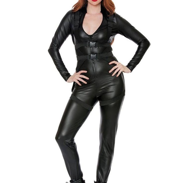 a woman in black catsuits posing for the camera with her hands on her hips