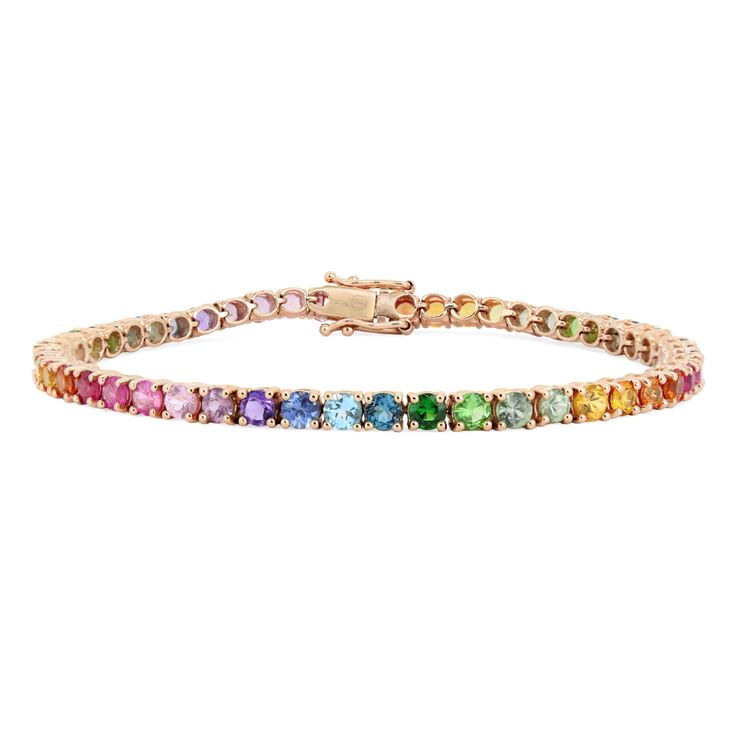 Get lost in a kaleidoscope of color with this rainbow tennis bracelet. An assortment of vibrant 3.0mm stones sit in four prong settings along the slim 14K gold backing, making this a dreamy 6.78Ct tennis bracelet. Multicolor Fine Jewelry Tennis Bracelet With Jubilee Style, Fine Jewelry Multicolor Tennis Bracelet With Jubilee Style, Multicolor Gemstone Tennis Bracelet, Multicolor Multi-stone Round Tennis Bracelet, Gold Band Bracelet, Gold Sunset, Tennis Jewelry, Pretty Jewelry Necklaces, Bracelet Tennis