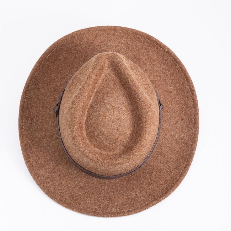 Wherever you roam, Topaz wide brim hat navigates the territory with ease. This women's hat is made of durable felted wool that's structured yet flexible. Inside is a soft inner band for a comfy, snug fit. Full brim Felted wool for a soft touch Coated hatband cord Felted wool Spot clean Soft inner sweatband Brim length: 7.5 cm One size; Women's-specific fit Style #0238 Quality Hats, Felted Wool, Wide Brimmed Hats, Hat Band, Brim Hat, Wide Brimmed, Small Groups, Wool Felt, Hats For Women