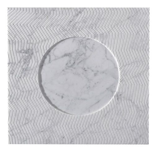 a white marble plate sitting on top of a gray and white cloth covered tablecloth