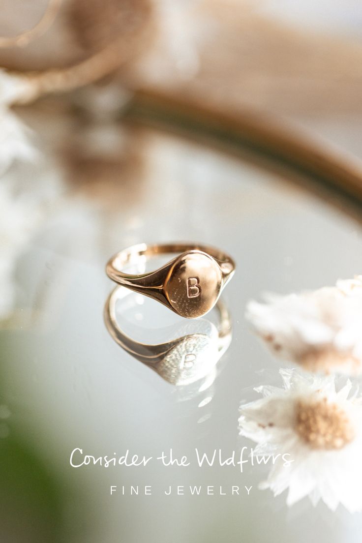 The Classic Namesake Signet is a vintage-inspired, classic signet ring. This signet is an easy, everyday piece that can be customized with a letter, number or graphic to make it personal and to tell your story. Available in 14k yellow, white, or rose gold. Heirloom 14k Gold Initial Ring For Everyday, Dainty 14k Stamped Signet Ring For Everyday, Dainty Everyday 14k Stamped Signet Ring, Heirloom Engraved Yellow Gold Ring For Everyday, Everyday Yellow Gold Heirloom Engraved Ring, Dainty Rose Gold Oval Signet Ring, Everyday Heirloom Yellow Gold Engraved Ring, Anniversary Domed Hallmarked Signet Ring, Anniversary Hallmarked Domed Signet Ring