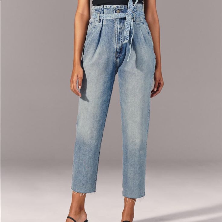 Nwt Ultra High Rise Denim. The Perfect Mom Jean. Very Feminine Fit, Definitely Shows Off Your Assets! Features Cropped Raw Hem, Zip Front With Top Button Closure, Classic Tapered Straight Leg Styling, Medium Light Wash, Belt Included. Just Love The Amazing Fit And Feel71% Cotton, 28% Lyocell, 1% Elastane. Approximate Measurements: Size 26/2us Waist 26”, Rise 12.75”, Inseam 26.5”. No Trades Ever Mid-rise Blue Cropped Jeans With Belt Loops, Blue Mid-rise Cropped Jeans With Belt Loops, Chic Denim Pants With Belt Loops, Chic Medium Wash Jeans With Belt Loops, Chic Cropped Denim Jeans With Belt Loops, Chic Medium Wash Cropped Jeans With Belt Loops, Chic Denim Blue Bottoms With Paperbag Waist, Blue Cropped Jeans With Tapered Leg, Chic Cropped Jeans In Medium Wash With Belt Loops