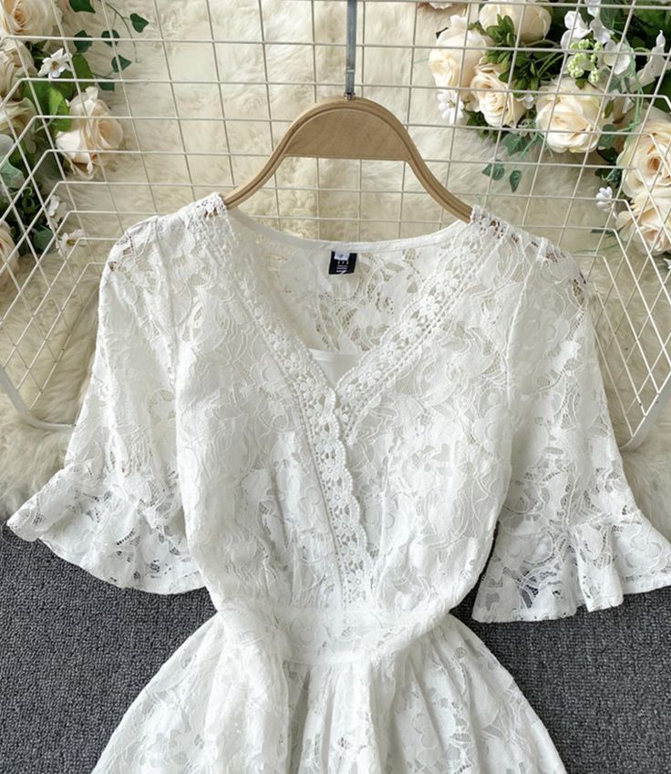 White A line lace v neck dress Fabric: lace Color: white Size: S, M, L, XL S length 125 bust 88 waist 68 sleeve length 32 M length 126 bust 92 waist 72 sleeve length 33 L length 127 bust 96 waist 76 sleeve length 34 XL length 128 bust 100 waist 80 sleeve length 35 2XL length 129 bust 104 waist 84 sleeve length 36 Scalloped Lace V-neck Dress For Brunch, Delicate Lace V-neck Dress For Brunch, Feminine V-neck Delicate Lace Top, Summer V-neck Lace Dress, Feminine V-neck Delicate Lace Dress, White V-neck Lace Dress With Lace Trim, Chic V-neck Dress With Delicate Lace, Elegant White V-neck Lace Top, Elegant V-neck Lace Dress For Brunch