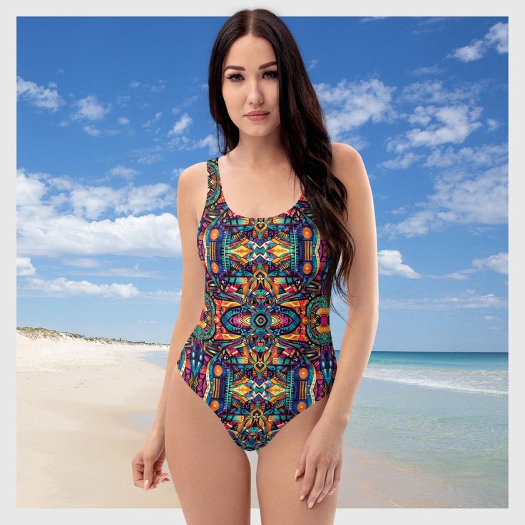 This Women's Cheeky One-Piece Swimsuit/Bathing Suit for all figures will bring out your best features. Enjoy the smooth fabric and the Unique & Colorful Abstract Tribal Design, and show it off by the beach or pool! Sizes XS-Plus Size available. * 82% Polyester, 18% Spandex * Fabric weight: 6.78 oz/yd² (230 g/m weight may vary by 5% * Chlorine-resistant fabric * Cheeky fit with a scoop neckline and a low scoop back * Zig-zag stitching * Double-layer front  * Four-way stretch material stretches an One-piece Tankini For Sunbathing During Beach Season, Multicolor One-piece Swimwear For Pool, Festival Printed Fitted Swimwear, Tropical Multicolor Bodysuit For Pool, Festival Fitted Printed Swimwear, Multicolor Tropical Print Tankini For Swimming, Summer Swimwear With Bold Print For Sunbathing, Vibrant Swimwear For Beach Season Party, Bold Print Beachwear Swimwear For Summer