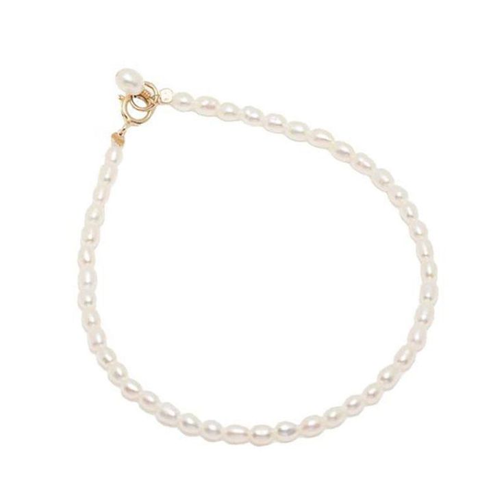 Adorn your wrist with timeless elegance in our Classic Dainty Pearl Bracelet. Delicately crafted, this bracelet features lustrous pearls, creating a graceful and sophisticated accessory. The understated design adds a touch of refinement to any ensemble, making it perfect for both casual and formal occasions. Embrace the enduring beauty of pearls with this classic bracelet, a symbol of timeless style and grace. Feminine Pearl Drop Bracelets, Elegant Pearl Chain Bracelet For Formal Occasions, Elegant Adjustable Chain Bracelet With Pearl Charm, Elegant Pearl Chain Bracelet With Pearl Drop, Elegant White Chain Bracelet With Pearl Drop, Feminine Pearl Bracelets With Pearl Charm, Elegant Adjustable Pearl Charm Chain Bracelet, Classic White Chain Bracelet With Pearl Drop, Formal Pearl Charm Chain Bracelet