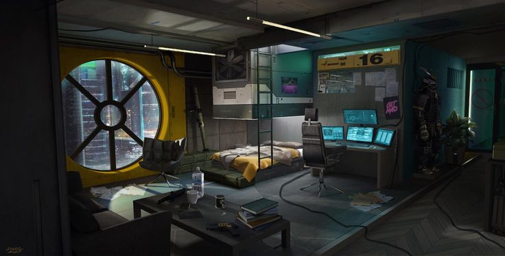 a room with two beds, desks and computers on the walls in front of a large circular window