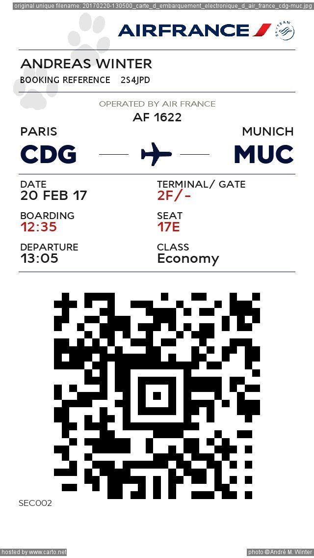 the airline ticket for an air france flight is shown in black and white, with red lettering