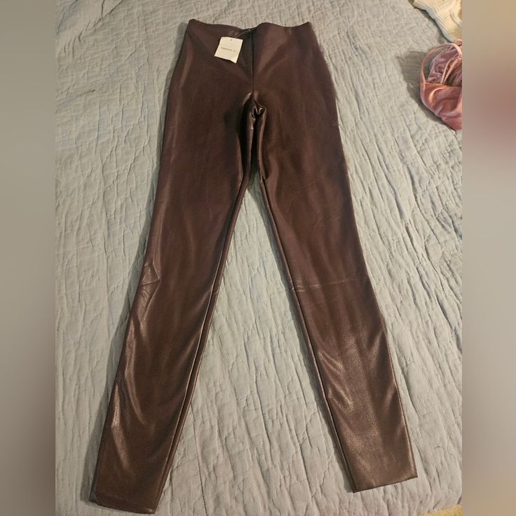 Faux Leather Leggings, Mocha, Size S Trendy Faux Leather Brown Leggings, Trendy Brown Faux Leather Leggings, Brown Stretch Leather Pants For Night Out, Stretch Brown Leggings For Night Out, Brown Stretch Leather Pants For Party, Brown Faux Leather Leggings For Fall, Brown Leather Leggings For Fall, Brown Fitted Leggings For Night Out, Fitted Brown Leggings For Night Out