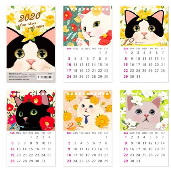 a calendar with cats and flowers on the front, one is for each month in which it