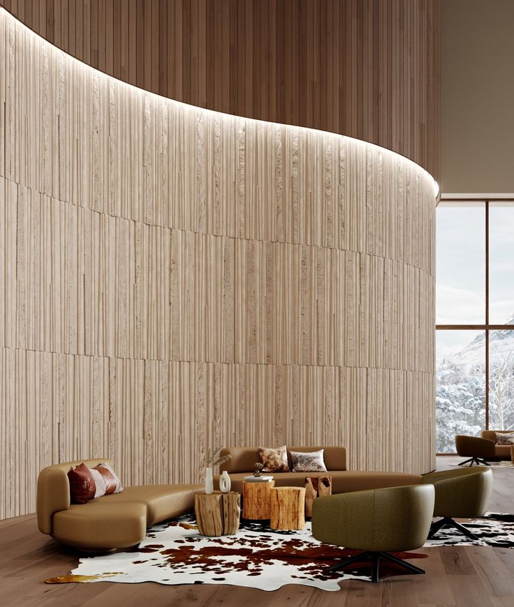 a living room filled with lots of furniture next to a tall wall covered in wooden slats