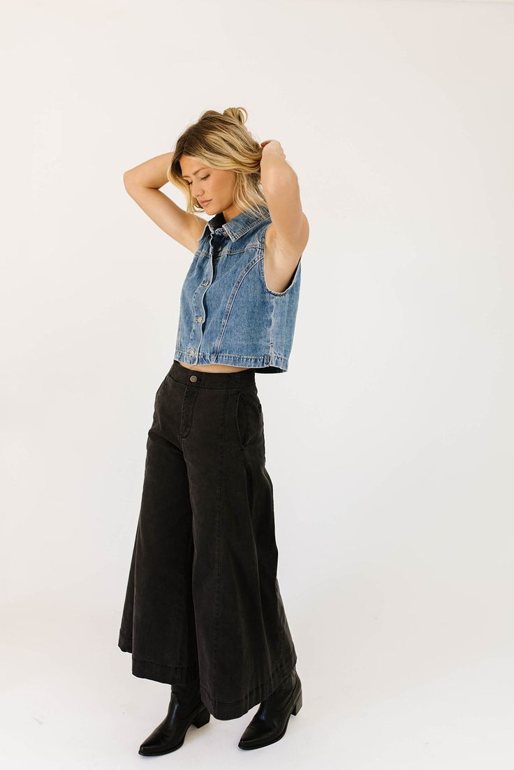 a pair of black wide-leg pants that are sooo good, you’ll never want to take them off. the high-rise + fitted waistline gives it “business casual” charisma, while the flowy loose legs keep things real + relaxed. full of versatility, you can dress them up or down for any occasion. black // wide leg, high waisted, one button zip fly, belt loops, pockets paired with our matilda mesh top + lover denim vest model is 5'8" + wearing a small measurements are approximate + taken while laying flat small : Black Wide Leg Pants, Denim Vest, Spandex Fabric, Matilda, Top Dress, Business Casual, Leg Pants, Mesh Top, Wide Leg Pants