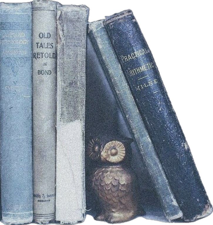 three books are stacked on top of each other with an owl figurine next to them