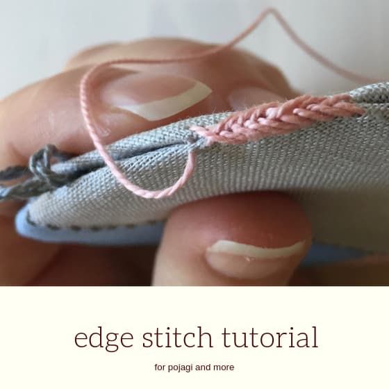 someone is stitching the edge of a doll's shoe with pink thread on it