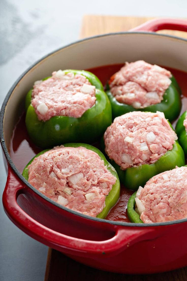 green peppers with meat in a red pot