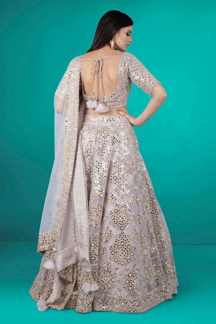 Upgrade your party look with our stunning Party Wear Lehenga D-240! Adorned with intricate mirror work, this lehenga will make you stand out in any crowd. Get ready to turn heads and make a statement with this beautiful piece. Experience the glamour and elegance for yourself! Semi-stitched Floor-length Sharara With Mirror Work, Sequin Lehenga For Eid Reception, Eid Reception Lehenga With Sequins, Reception Choli With Gota Work And Traditional Drape, Traditional Drape Choli With Gota Work For Reception, Reception Salwar Kameez With Mirror Work For Navratri, Navratri Reception Salwar Kameez With Mirror Work, Navratri Salwar Kameez With Mirror Work For Reception, Designer Fitted Anarkali Set With Mirror Work