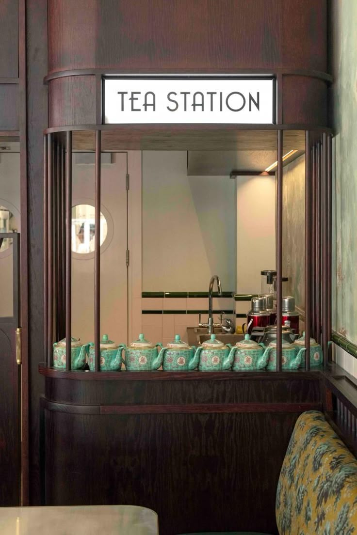 the tea station has many cups in it