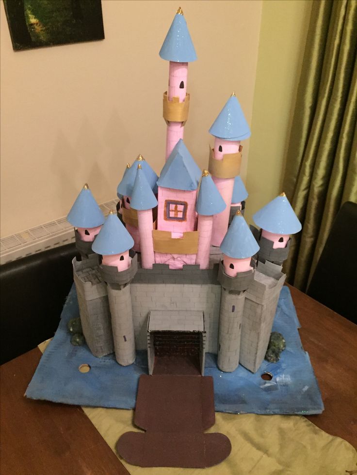 a castle made out of paper sitting on top of a table