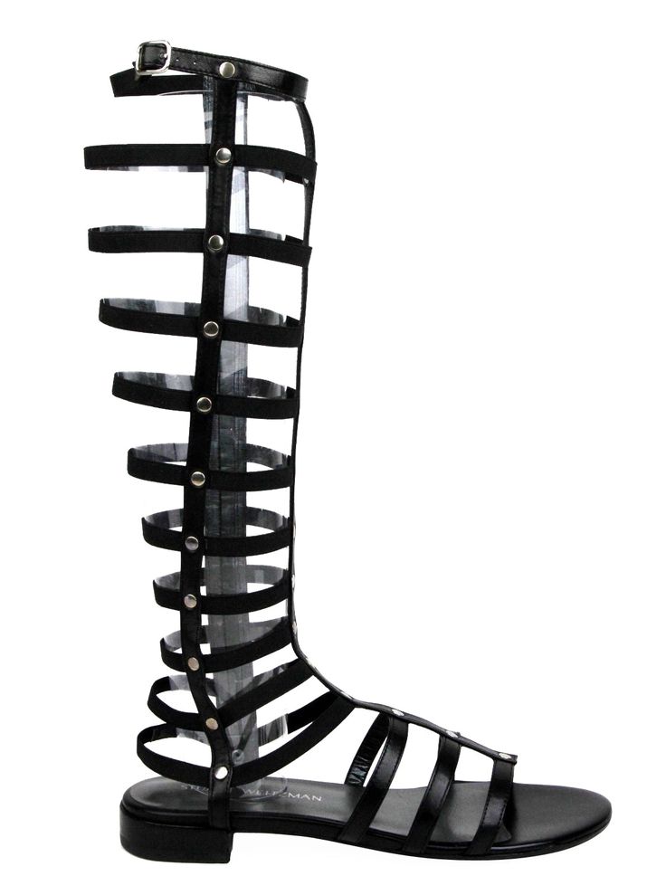 Made of Leather / Elastic; Pattern: Solid Style: Gladiator; Leather lining and sole Measurements: 0.75 heel; 14.5 H shaft; Boot Shaft Height: Thigh-High; Width: Medium (B, M); Heel Height Low (3 / 4 to 1 1 / 2 inches) Original Stuart Weitzman box, tags Made in Spain Tall Gladiator Sandals, Stretch Boots, Gladiator Shoes, Black Sandals Flat, Flat Gladiator Sandals, Caged Sandals, Leather Sandals Flat, How To Stretch Boots, Stuart Weitzman Shoes