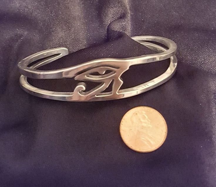 Eye of Horus recycled aluminum cuff bracelet may be ordered in small, medium and large sizes. Known in Egypt as The One Far Above, Horus represents protection, healing and restoration. Earrings, pendant necklace and link bracelet are also available. our cuff bracelets are made to order and we need your size FIRST just wrap string around the wrist then measure the string and send us a message - we'll respond with your size - check your messages for follow-up Thanks! Spiritual Stainless Steel Nickel-free Jewelry, Silver Spiritual Metal Cuff Bracelet, Spiritual Silver Metal Cuff Bracelet, Spiritual Hand Cast Bracelets As A Gift, Hand Cast Metal Bracelets Gift, Spiritual Hypoallergenic Bangle Jewelry, Spiritual Hand Cast Bracelet Jewelry, Spiritual Hand Cast Jewelry Bracelet, Spiritual Hand-cast Bracelet Jewelry