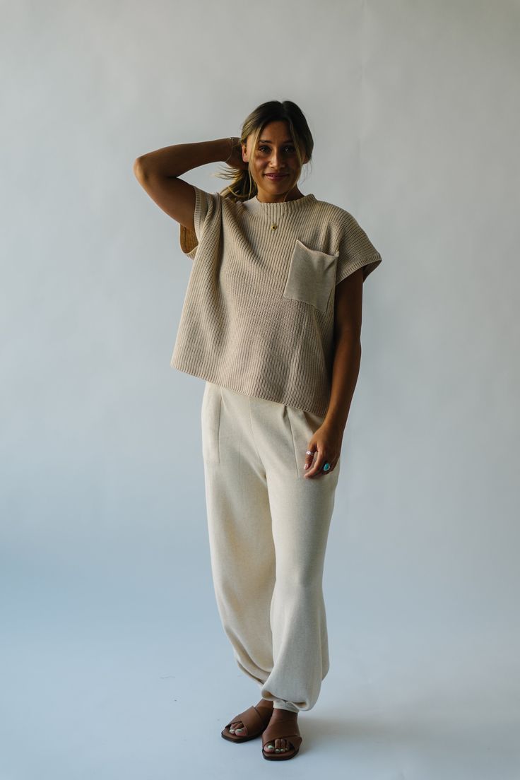 Introducing the playful and stylish Spackman Sweater Pant! Made with a cozy ivory fabric, this pant is perfect for lounging or running errands. Its unique design combines the comfort of a sweater with the convenience of pants. Stay cozy and stylish with this must-have addition to your wardrobe! (Takes loungewear to a whole new level!) Details self/lining: 85% polyester + 15% linen Fabric Care Guide Here Sizing & Fit Measurements are approximate and taken while laying flat across the front. Not doubled. small: waist = 12.5"; length = 37"; inseam = 26" medium: waist = 14"; length = 37.5"; inseam = 26.5" large: waist = 15.5"; length = 38"; inseam = 27" x-large: waist = 17"; length = 38"; inseam = 27" Try-on Video Cozy Cotton Pants, Cream Wide-leg Relaxed Fit Sweatpants, Cream Wide Leg Relaxed Fit Sweatpants, Cream Relaxed Fit Bottoms For Lounging, Cream Casual Sweatpants For Lounging, Casual Cream Sweatpants For Lounging, Cream Cotton Pants For Lounging, Neutral Relaxed Fit Pants With Side Pockets, Cream Cotton Lounge Pants