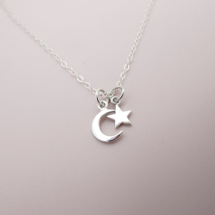 ALL STERLING SILVER - A GREAT KEEPSAKE This celestial necklace is lovingly hand-made with all solid sterling silver parts, making it a thoughtful gift (even for yourself!). A tiny moon and star dangles elegantly from the sparkly chain. Closes with an easy-to-use spring clasp. Moon charm measures approximately 3/8 inch tall and the star 1/4 inch tall. Comes in a gift box, perfect for gift-giving.  **SIZING - PLEASE READ: Select your necklace size at checkout. Note that necklaces will fit differen Tiny Star Necklace, Moon Goddess Necklace, Moon And Star Necklace, Crescent Moon Necklace Silver, Dainty Choker Necklace, Birthday Necklace Gift, Moon Necklace Silver, Star And Moon Necklace, Dot Necklace