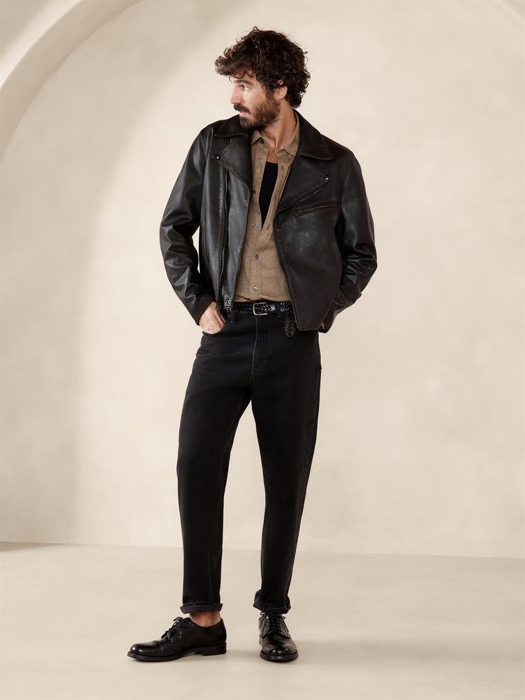 A timeless take on the iconic moto jacket, we kept all the details of the classic—an off-set zip closure, grommets under the arms, zippered cuffs and pockets—adding a Western-style yoke and a ruched accent at the back waist for rugged flair.  For a true-to-the-original finish, our designers selected a beautifully burnished leather and an oversized fit.  Warmer: Lightly lined for easy layering.  Relaxed fit.  Point collar with off-set zip closure.  Three exterior zip pockets.  Single interior pocket.  Fully lined.  Relaxed fit.  Long sleeves.  Hip length.  Model: Size M, 6'2" (188cm). 80s Punk Fashion, Metalhead Fashion, Rock Style Men, Men Styling, Fits Streetwear, Lesbian Fashion, New York Outfits, Leather Jacket Style, Streetwear Men Outfits