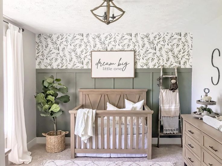 a baby's room is decorated in neutrals and whites